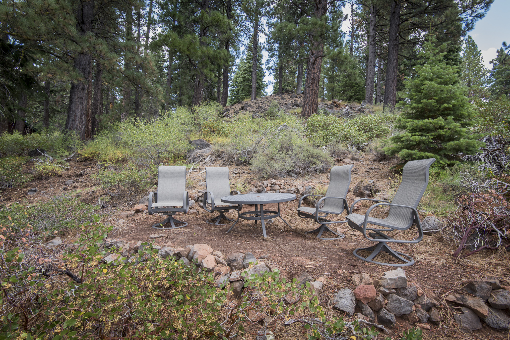 Sierra Meadows Glass House exterior table chairs