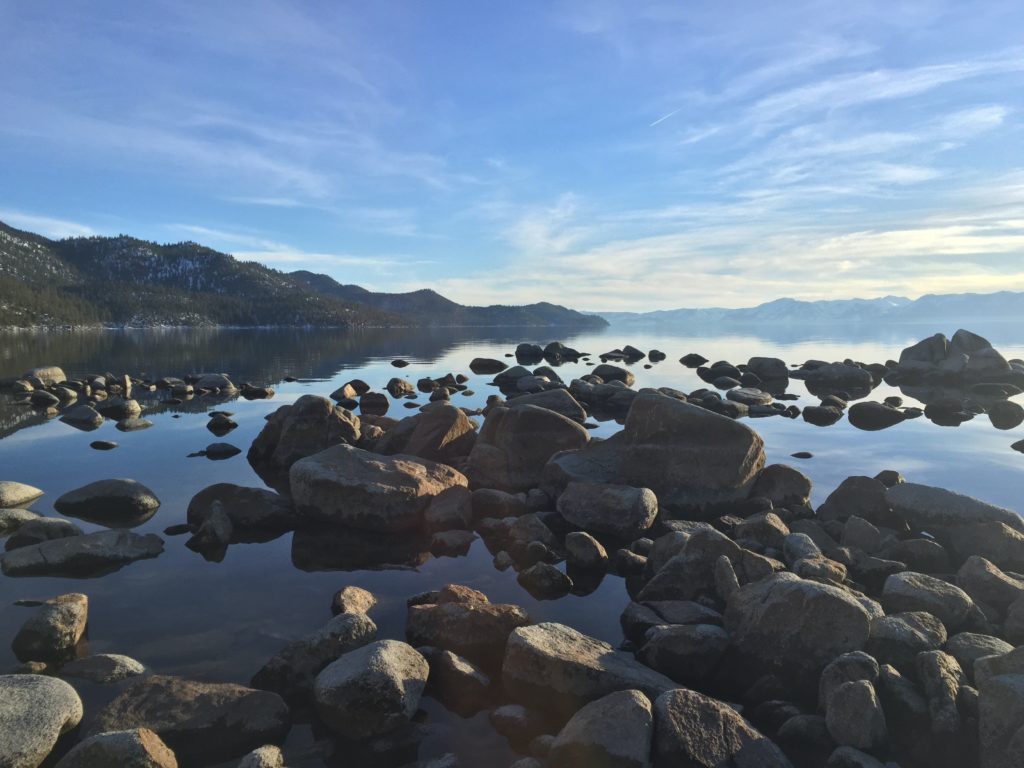 lake tahoe rocks and water with blue sku