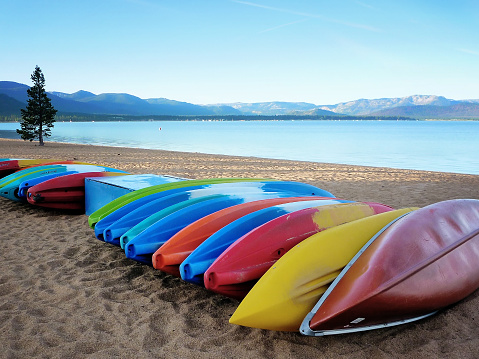 colorful kayaks lined up on kings beach