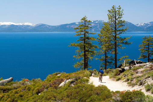 mountain biking with view of lake tahoe