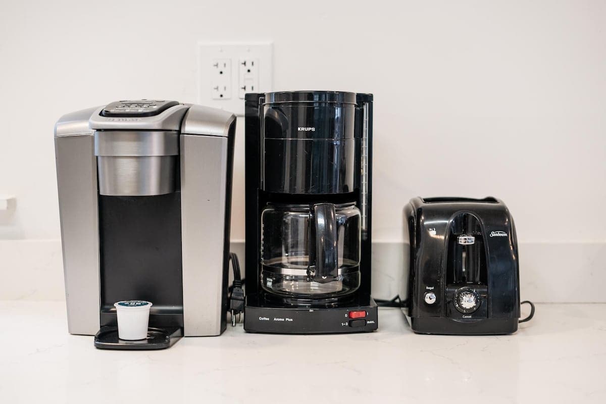 Coffee makers and a toaster on a kitchen counter in a Truckee vacation rental.