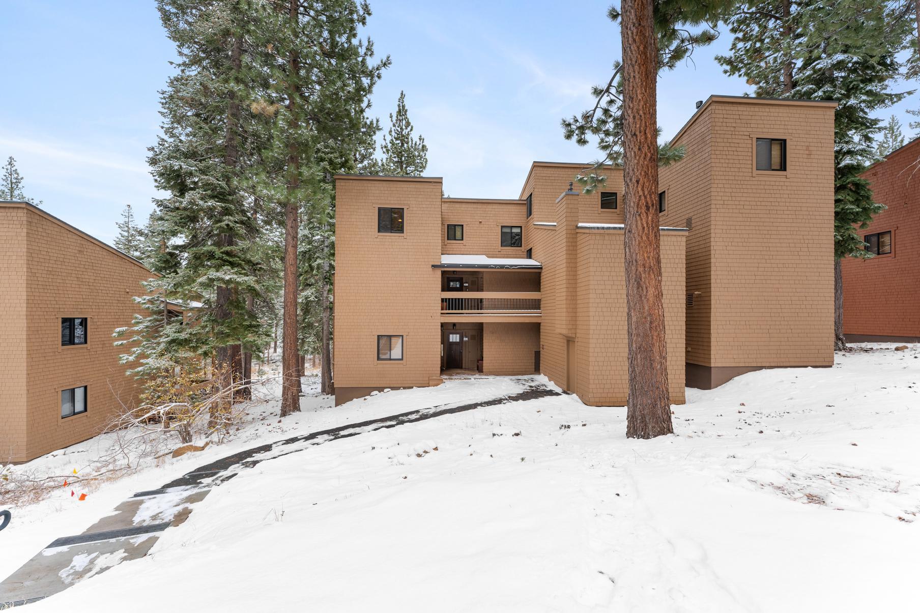 Brick building in snowy forest setting for a vacation rental in Truckee.