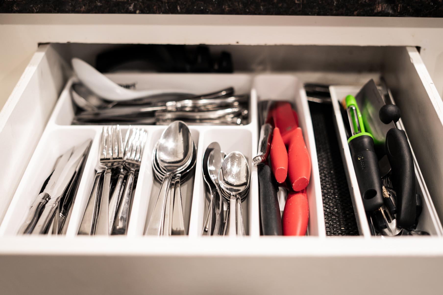 Kitchen drawer with utensils and tools in a Tahoe Vista vacation rental.