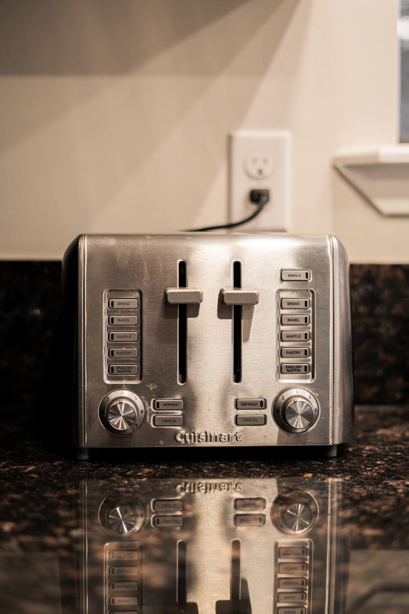 Stainless steel toaster on a granite countertop in a Tahoe Vista vacation rental kitchen.