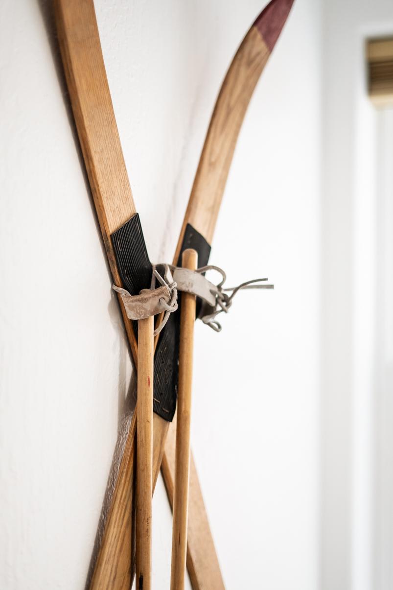 Vintage skis decor on a wall in a Truckee vacation rental, adding rustic charm and warmth to the space.