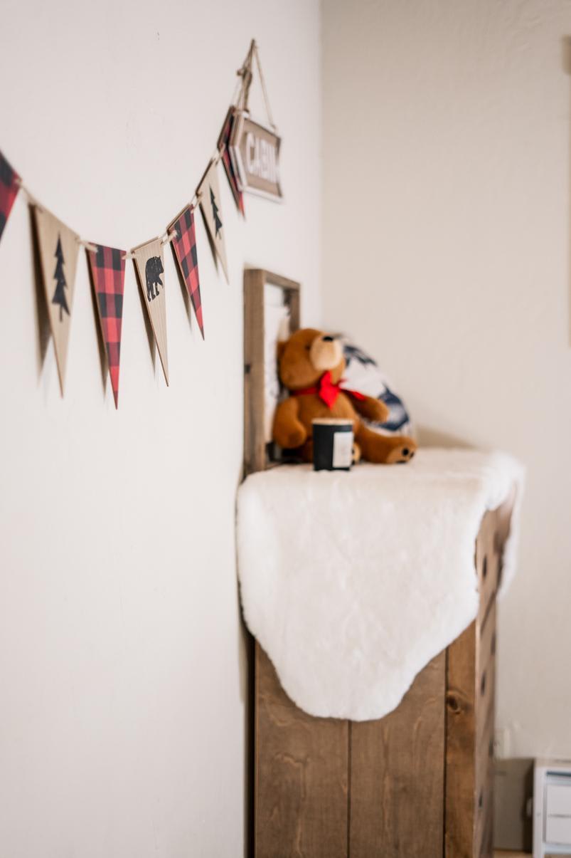 Cozy decor with a teddy bear and cabin theme in a Truckee vacation rental.