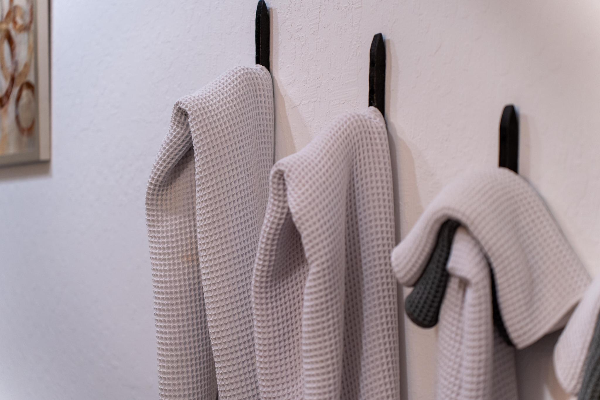 Cozy towels hanging in a Truckee vacation rental, offering a touch of comfort and style in the space.