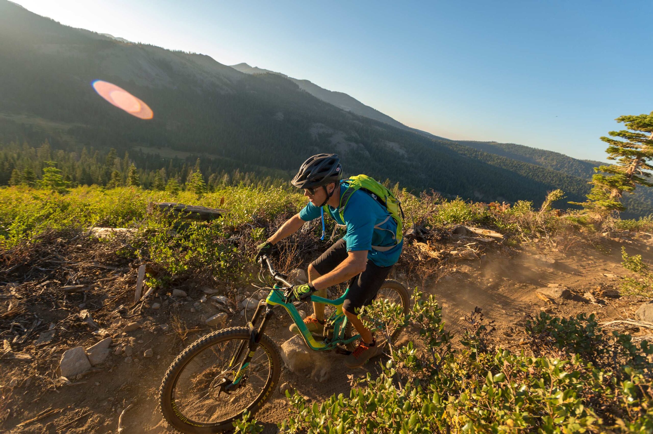 Mountain biker on a trail near Truckee, ideal for a vacation rental getaway in nature.