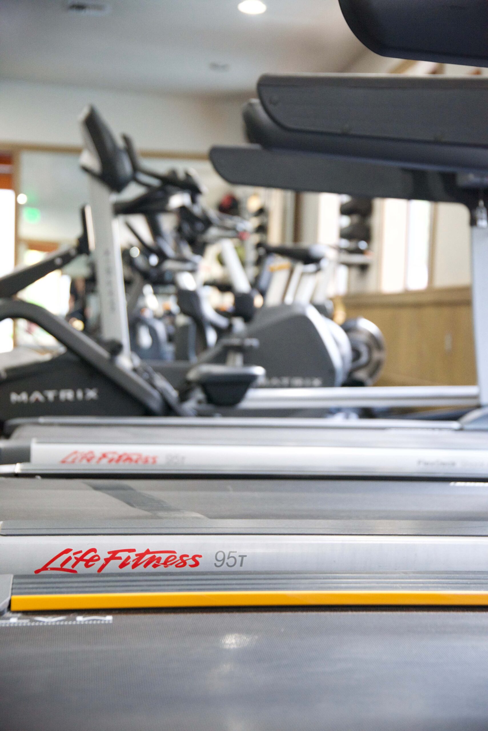 Treadmills and exercise bikes in a gym at a vacation rental in Truckee.