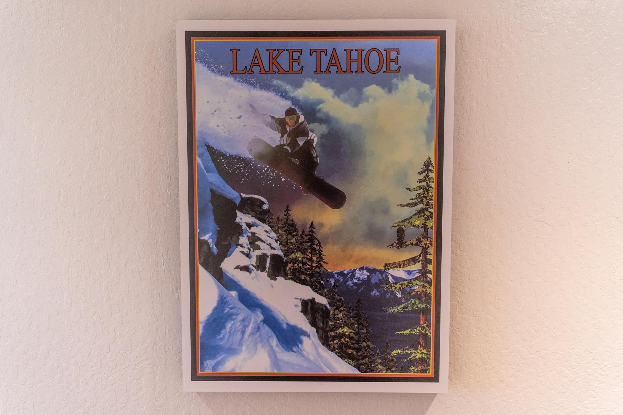 Poster of a snowboarder in Lake Tahoe decorates a wall at a Truckee vacation rental.