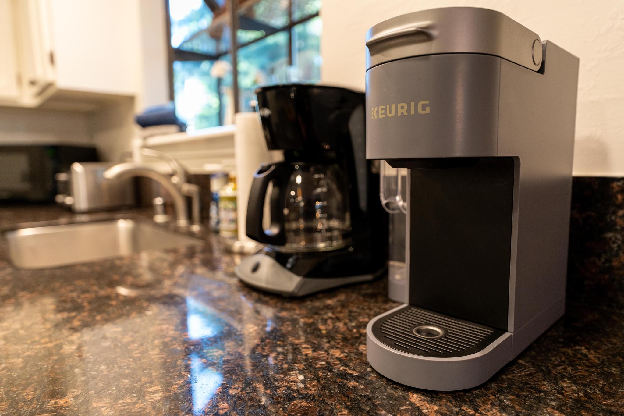 Kitchen counter with coffee makers and sink in Tahoe Vista vacation rental.