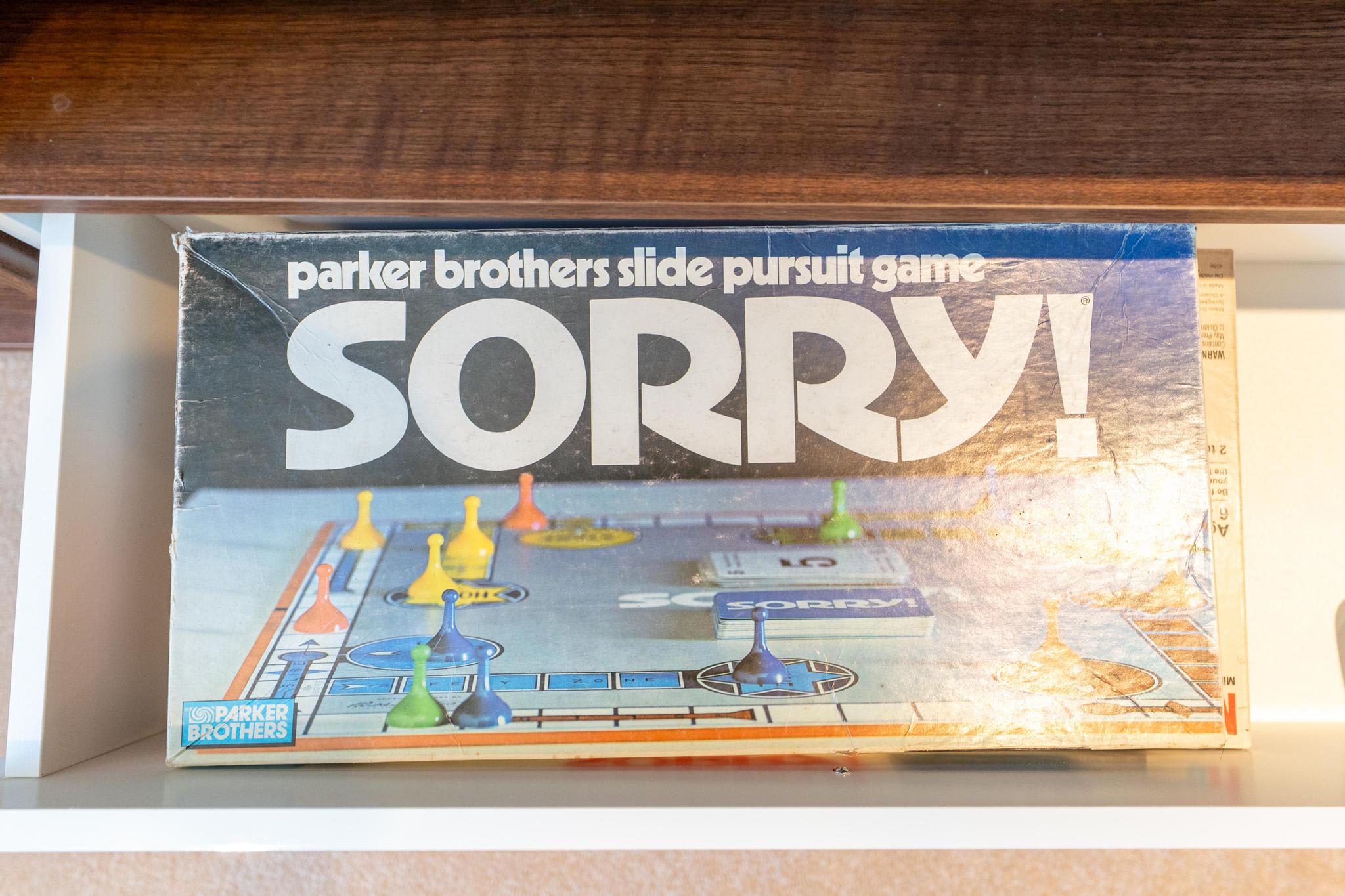 Board game Sorry! in a Truckee vacation rental shelf, inviting guests for fun indoors.