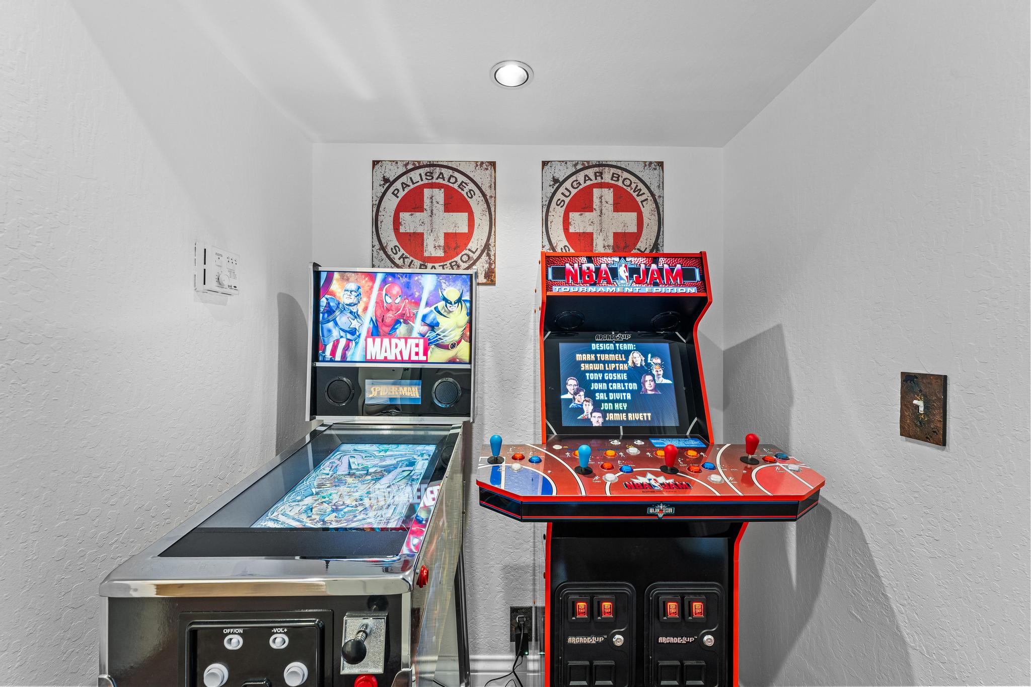Arcade games in a Truckee vacation rental featuring Marvel pinball and NBA Jam.