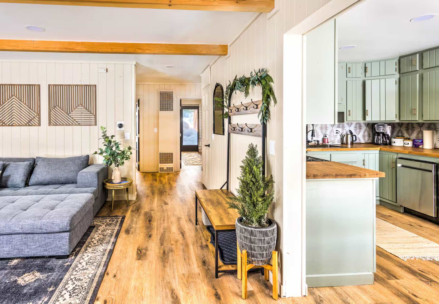 Cozy interior of a Kings Beach vacation rental with modern kitchen, wooden floors, and a stylish living area.