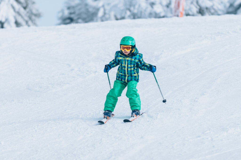 child skiing